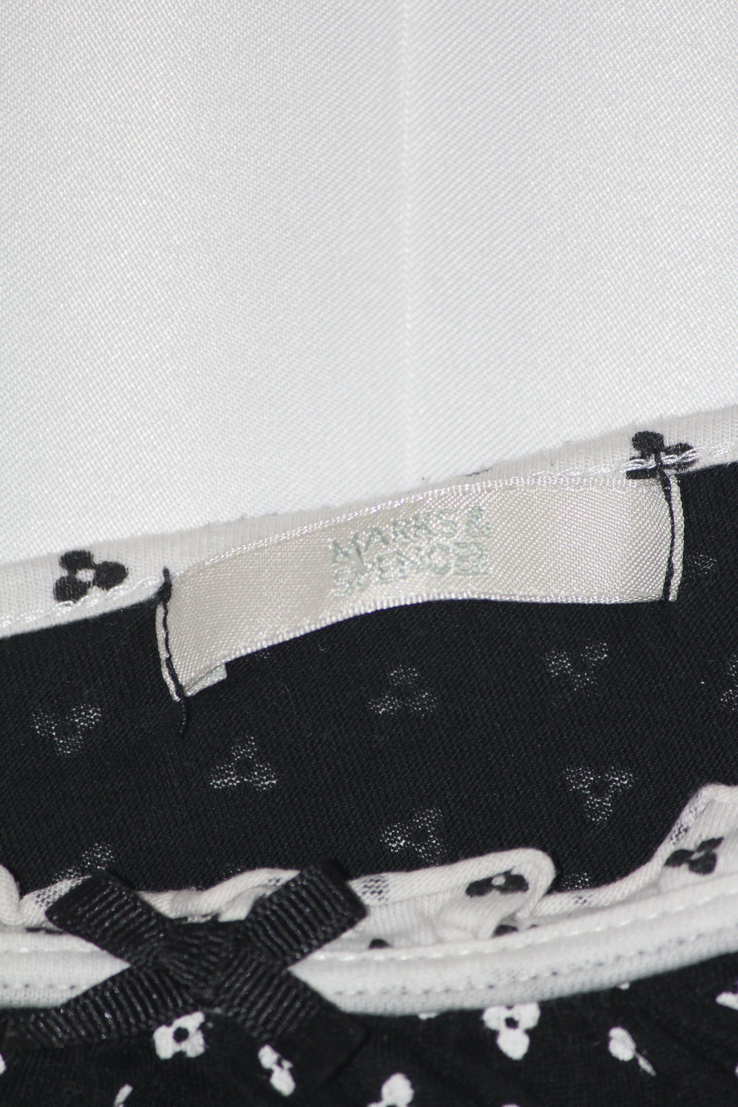 M&S Black Tank Top with White Bow Design